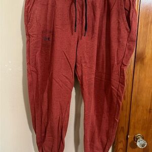 Under Armour Orange joggers with Black Logo